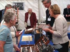 People at the GCHQ stand at the Enigma Reunion 2009. Copyright Kevin Coleman [3].